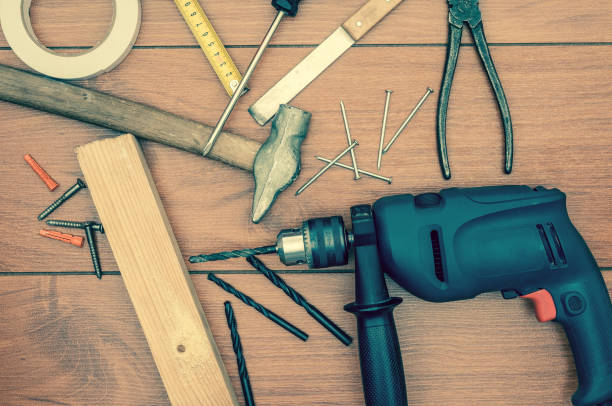 Working tools on wooden background